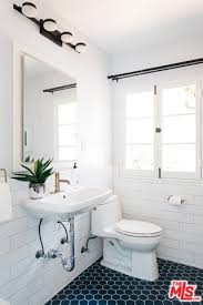 The monotony of the pure white walls is broken by two peculiar black lines that accentuate the patterned black tiles of the floor. 50 Spanish Style Primary Bathroom Ideas Photos Home Stratosphere