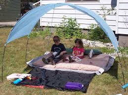 Diy Shade Tent For My Kids Dollar Store Table Cloth Old Tent Rods And Duct Tape Diy Shades Diy Tent Kids Play Yard