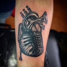 Double hearts to show your love to parents. 89 Creative Music Tattoos That Are Sure To Blow Your Mind Warmart Ink Tattoo And Body Piercing
