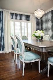 Back to black and white dining room. Black And White Dining Room With Blue Chairs Hgtv