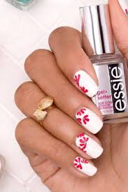 Now let the coat dry and then start drawing a simple white floral swirl with the help of nail art brush. 14 Best White Nail Designs White Manicure Art Tutorials