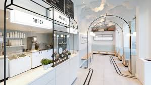Cloud Like Ceilings And Neon Signage Are Some Of The Playful Features That Formroom Emp Store Design Interior Commercial Interior Design Retail Interior Design