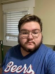 shaving beard for breast cancer awareness month