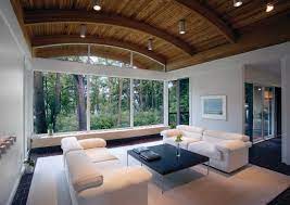 Modern rustic living room with red accents. River Home Living Room With A Forest View Contemporary Living Room Other By Everitt Design Houzz