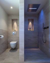 The dark color which produces by marble shower tile in this small walk in shower looks perfect with the curved glass brick wall. 18 Doorless Shower Ideas Bathrooms With Doorless Showers Decor Snob