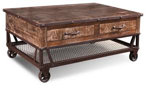 Vasagle industrial coffee table with storage shelf for living room, wood look accent furniture with metal frame, easy assembly, rustic brown c shaped side end table mobile snack coffee table with lockable wheels under sofa couch bed for laptop tablet for small spaces living room. Addison Loft Rustic Solid Wood Coffee Table On Casters Industrial Coffee Tables By Crafters And Weavers