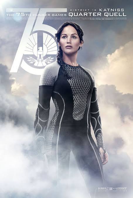 Catching Fire Poster: Jennifer Lawrence Strikes a Pose for the Hunger Games  Sequel (and/or Heaven-Set Surfer Movie) | Vanity Fair