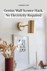 Genius Wall Sconce Hack No Electricity Required Hunker Wall Sconces Bedroom Bedside Wall Lights Plug In Wall Lights