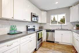 White And Gray Kitchen Room With Modern Stainless Steel Appliances Stock Photo Picture And Royalty Free Image Image 110173551