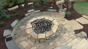 Building a backyard fire pit. How To Build A Stone Fire Pit Diy