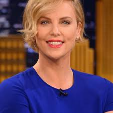 Charlize theron side swept bangs hairstyle charlize therons short side parted hairstyle curly hair of charlize theron The 70 Best Short Haircut And Hairstyle Ideas