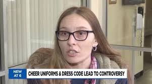 Mom says daughter was told to 'cover up' while wearing cheerleading uniform  at school