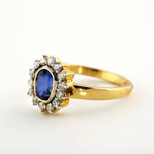 Gold Diamond Ring With Blue Stone Manik Chand Jeweller Kolkata Black Gold Ring Sapphire Engagement Ring Blue Blue Topaz Engagement Ring