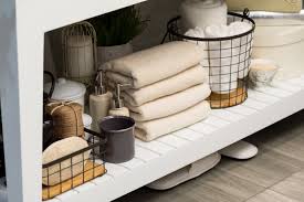 Stock a basket or tray with spray cleaners, paper towels or microfiber cloths, disinfectant wipes, brushes, sponges, and other essentials to keep your sink and countertop sparkling. 9 Items You Should Have To Organize Your Apartment Bathroom