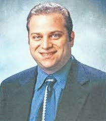 Dentist, acquitted of tax fraud charges, sues for wrongful prosecution