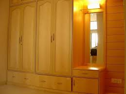 Interior Design For Dressing Table With Wall Light And Drawer Wardrobe Design Pooja Room Design Design