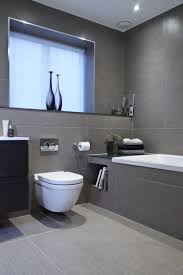 At your doorstep faster than ever. 15 Ingenious Bathrooms That Embrace Your Love For Books Gray Bathroom Decor Bathroom Interior Design Small Bathroom Remodel