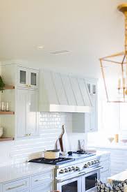 A mullion, in regard to glass cabinetry, is an element that divides the glass. French Normandy Renovation Design Build Construction