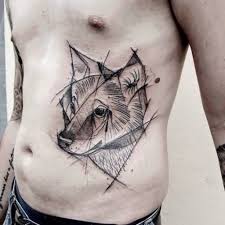 Fantastic And Simple Wolf Face Tattoo On Men Rib Side Wolf Face Tattoo Geometric Wolf Tattoo Sketch Style Tattoos