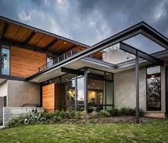 My house plan calls for steel beams that will support the floor joists and even parts of a brick wall. Astm A588 Steel I Beam Atmospheric Resistance Steel Frame House Architecture Modern Architecture Design