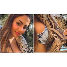 Catherine Bascoy Randi faz vídeo com cobra no pescoço