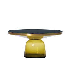 The coffee tables are handmade of rough mango wood which is solid, stable, durable and beautiful, and the craftsmanship adds to their spectacular retro style. Classicon Bell Coffee Table Brass Ambientedirect