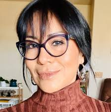 Who can recommend a tattoo artist for a specific design?