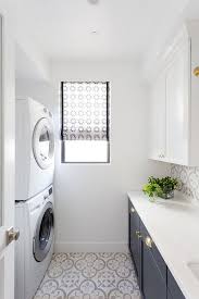 Laundry Room With Grey Cement Tile Laundry Room With Grey Cement Tile And Dark Navy Lower Cabinet Laundry Room Tile Laundry Room Design Farmhouse Laundry Room