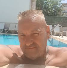 After somebody to come remove a planter and some rubble and other bits of  concrete/garden/builders waste.. planter is roughly 8ft x 7.5ft maybe a  tonne or so of soil/stones plus the timber