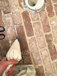 Trying to convince the hubby to do this in our foyer and your tutorial just might do it. How To Install Thin Brick Floors Thin Brick Brick Flooring Brick Tile Floor