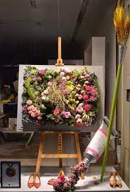 17 Fun Ideas To Celebrate Spring With Flower Decor Homelysmart Spring Window Display Spring Window Display Ideas Spring Window