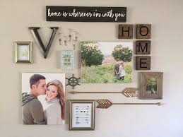 Your homemade wall decor will transform your living space without having to break the bank. Diy Gallery Wall Inspiration And Idea Coastal Theme With Arrows Canvas And Photos Loves The Find Wall Decor Bedroom Diy Gallery Wall Gallery Wall Decor