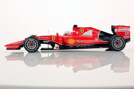 The chassis was designed by rory byrne, giorgio ascanelli, aldo costa, marco fainello, willem toet and nikolas tombazis with ross brawn playing a vital role in leading the production of the car as the team's technical director and paolo martinelli assisted by giles simon leading the engine. Ferrari Sf15 T Sebastian Vettel Belgium 2015 900 Gp 1 18 Looksmart Models