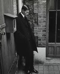 21-years old Yves Saint Laurent at Christian Dior's funeral, 1957