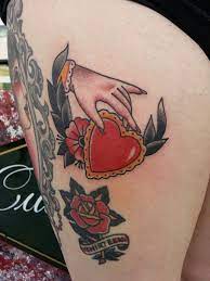 Traditional Hand Holding Heart Valentine Tattoo By Steve Rieck Las Vegas Traditional Tattoo Hand Holding Heart Tattoo Trendy Tattoos