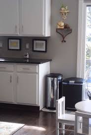 White Cabinets Light Gray Walls Dark Gray Countertops Black Stainless Steel Appliances Furnit Grey Kitchen Walls Light Grey Kitchens Kitchen Wall Colors