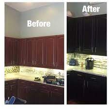 If the cabinets are stained… if you want a darker tone than the one you currently have, you may be able to simply tint the existing finish. Black Kitchen Cabinets Timeless Beauty For All Kitchen Types