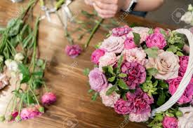 Maybe you would like to learn more about one of these? Handsome Fresh Bouquet Flowers Delivery Woman Florist Create Flower Arrangement In A Wicker Basket Beautiful Bouquet Of Mixed Flowers Floral Shop Concept Stock Photo Picture And Royalty Free Image Image 129969488
