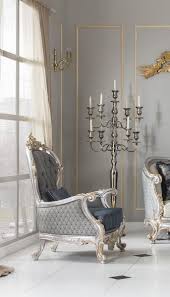 Transform stark, sterile spaces by adding warm, welcoming accents that will make the living room the most inviting space in the house. Casa Padrino Luxury Baroque Living Room Armchair With Decorative Pillow Gray Blue Silver Gold 82 X 75 X H 122 Cm Noble Magnificent