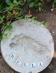 I bought a stepping stone kit from michaels for about $17 which came with the cement powder, a plastic mold, letter/number stamps, colored glass beads and mosaic tiles. Concrete Stepping Stone Tutorial Footprint Stepping Stones Stepping Stones Diy Backyard Activities