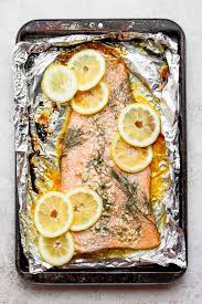 Baking salmon fillets, covered, with a little wine and some shallots produces moist, succulent results as long as you remember the two cardinal rules of fish cookery: Baked Salmon In Foil With Lemon Dill Fit Foodie Finds