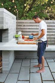with a pizza oven, this backyard became
