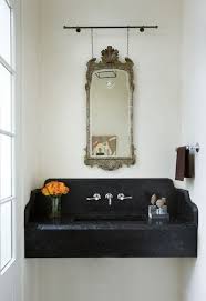 Wall hung basins at victorian plumbing are a stylish and compact option for smaller bathrooms. Black Marble Floating Sink Eclectic Bathroom Phoebe Howard Hanging Mirror Floating Sink Bathroom Design