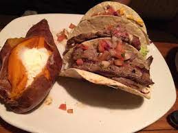 Seared sirloin atop mixed greens, aussie crunch, tomatoes, red onions, cinnamon pecans and a danish blue cheese vinaigrette. Steak And Fish Tacos Picture Of Outback Steakhouse Waynesboro Tripadvisor