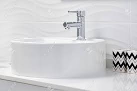 Maybe you would like to learn more about one of these? Close Up Of New Clean White Round Shaped Ceramic Sink And Faucet Stock Photo Picture And Royalty Free Image Image 126041158