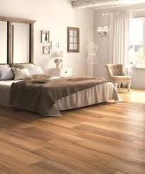 Below is a bedroom flooring in wood look tile with added decorative elements from the french woods porcelain collection by iris ceramica. Bedroom Floor Tiles Kerala Types Prices Paittakkulam Marbles