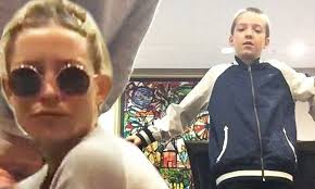Kate Hudson and son Ryder Robinson make a dance video while waiting in the  airport