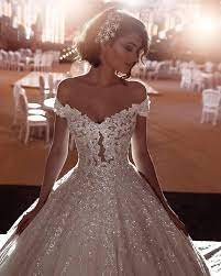 15 Of The Sparkliest Wedding Dresses We Ve Ever Seen Sparkle Wedding Dress Princess Wedding Dresses Goddess Wedding Dress