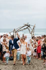 We specialize in all facets of wedding events elopements, destination, small and large wedding parties up to 175 guests. Nz Beach Wedding Just Married Bride Groom Page Boys New Zealand Beach Beach Wedding Beach Wedding Inspiration