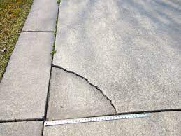 We transformed an old cracked concrete slab by resurfacing. A Repair For Cracked Concrete That Almost Looks Perfect
